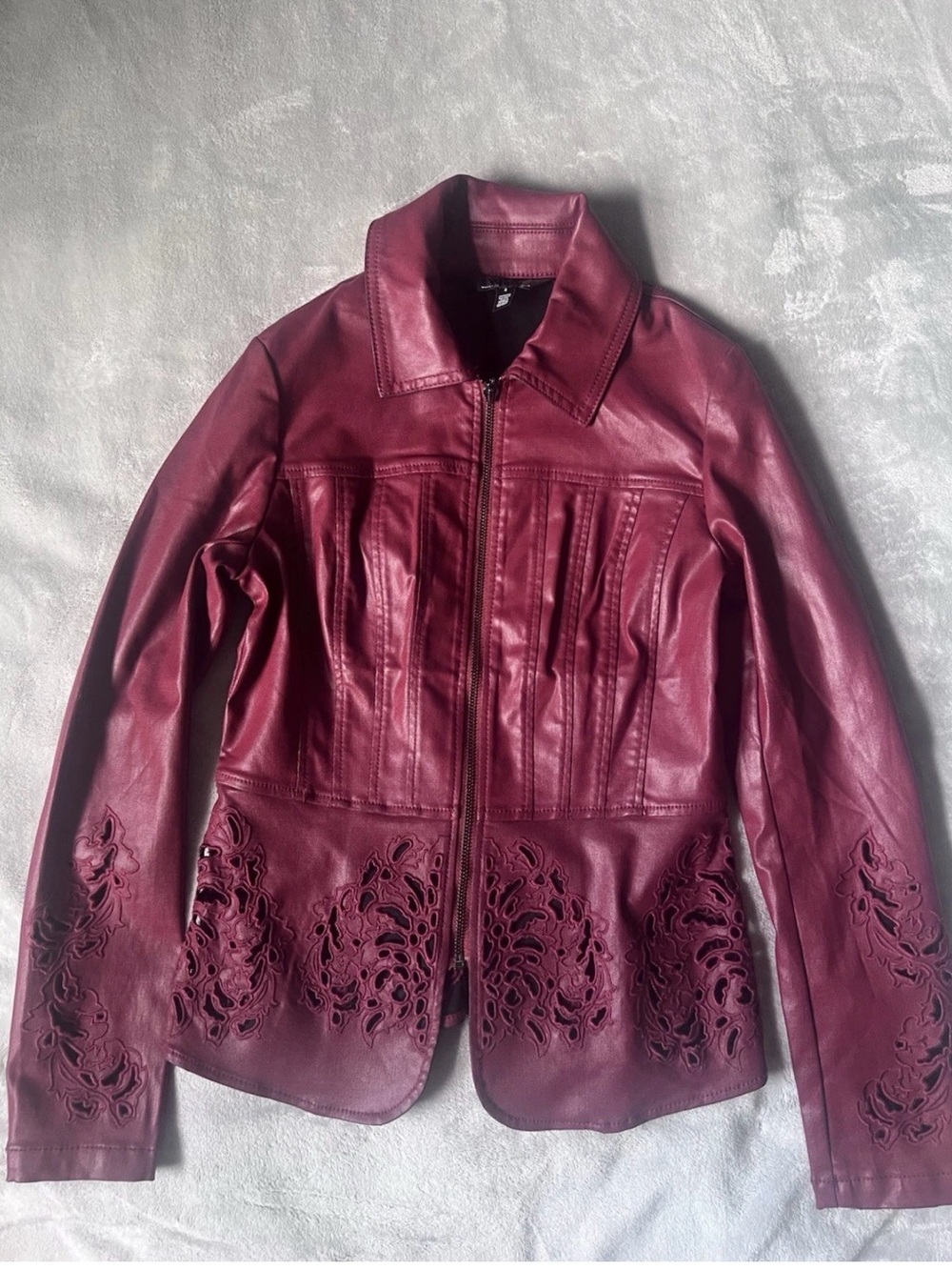 White House Black Market Deep Burgundy Leather Jacket with Laser Cut Details